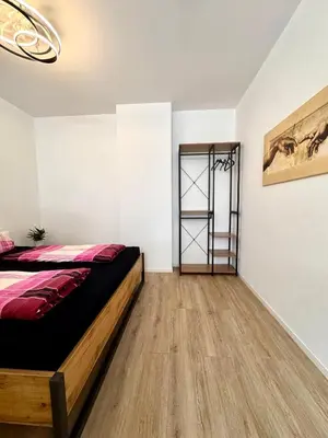 Ein Bett oder Betten in einem Zimmer der Unterkunft Appartment in Freizeitpark