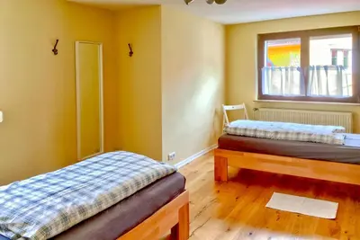Ein Bett oder Betten in einem Zimmer der Unterkunft Ferienwohnung Mäder