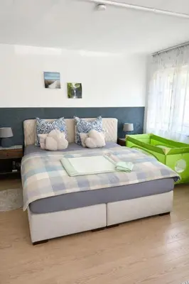 Ein Bett oder Betten in einem Zimmer der Unterkunft Apartment Messe Karlsruhe