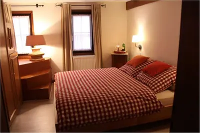 Ein Bett oder Betten in einem Zimmer der Unterkunft Ferienhaus Glöcknerhaus