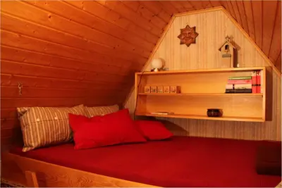 Ein Bett oder Betten in einem Zimmer der Unterkunft Ferienhaus Glöcknerhaus