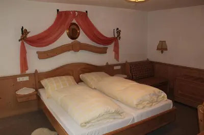 Ein Bett oder Betten in einem Zimmer der Unterkunft Gasthof Jäger