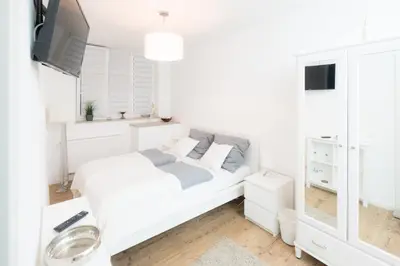 Ein Bett oder Betten in einem Zimmer der Unterkunft Miniapartment am Dalberg