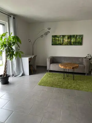 Ein Sitzbereich in der Unterkunft Gemütliches Apartment nahe Porsche