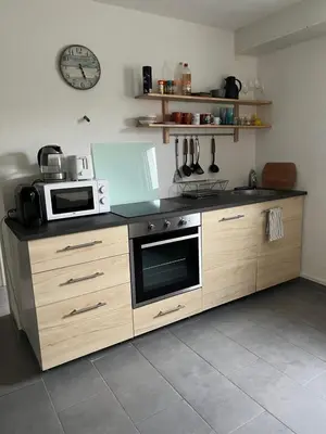 Küche/Küchenzeile in der Unterkunft Gemütliches Apartment nahe Porsche