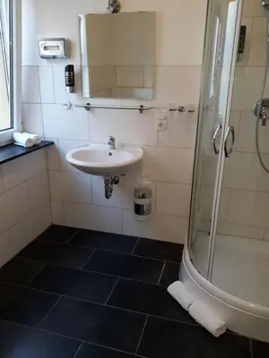 Ein Badezimmer in der Unterkunft Hotel Restaurant Stern