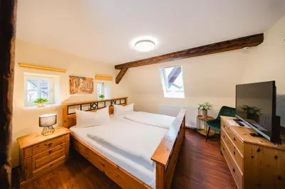Ein Bett oder Betten in einem Zimmer der Unterkunft Landhotel im Hexenwinkel