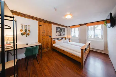Ein Bett oder Betten in einem Zimmer der Unterkunft Landhotel im Hexenwinkel