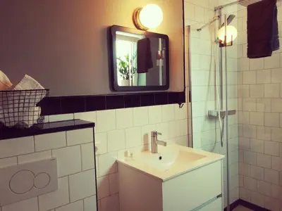 Ein Badezimmer in der Unterkunft Oleander Hof