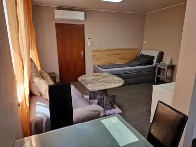 Ein Bett oder Betten in einem Zimmer der Unterkunft Ferienwohnung Alte Linde
