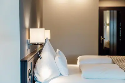 Ein Bett oder Betten in einem Zimmer der Unterkunft Hotel Krone