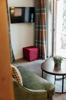 Ein Sitzbereich in der Unterkunft Hotel Krone