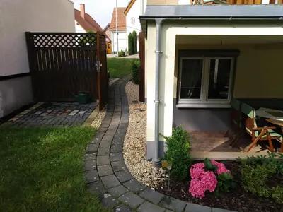 Ein Garten an der Unterkunft House of ‘Welcome