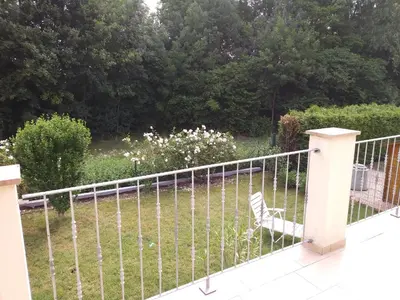 Ein Garten an der Unterkunft House of ‘Welcome