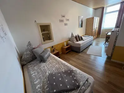 Ein Bett oder Betten in einem Zimmer der Unterkunft Ferienwohnung Vino Palatina