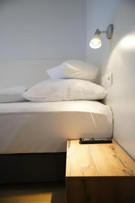 Ein Bett oder Betten in einem Zimmer der Unterkunft AP Hotel Mannheim Viernheim am Kapellenberg