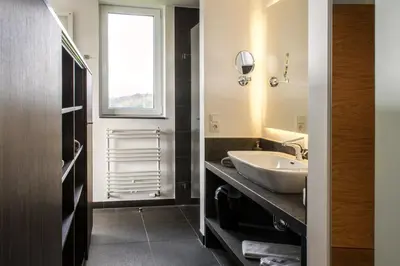 Ein Bett oder Betten in einem Zimmer der Unterkunft BURGHOF - DAS HOTEL