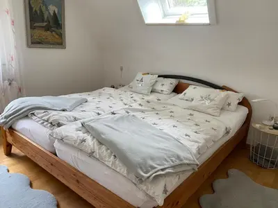 Ein Bett oder Betten in einem Zimmer der Unterkunft Ferienwohnung Baier