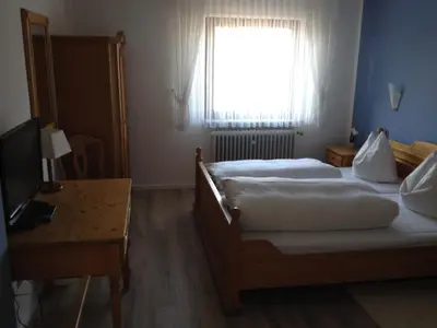 Ein Bett oder Betten in einem Zimmer der Unterkunft Hotel und Restaurant -Gasthaus Zur Pfalz