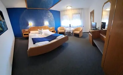 Ein Bett oder Betten in einem Zimmer der Unterkunft Hotel Rössle