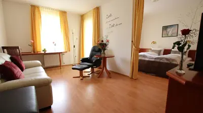 Ein Bett oder Betten in einem Zimmer der Unterkunft Hotel Kurparkblick inkl Therme und Sauna Eintritt
