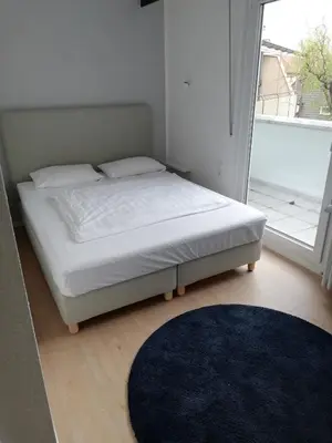 Ein Bett oder Betten in einem Zimmer der Unterkunft City Hotel und City Apartments Centrum
