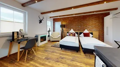 Ein Bett oder Betten in einem Zimmer der Unterkunft Pension Bottwartal