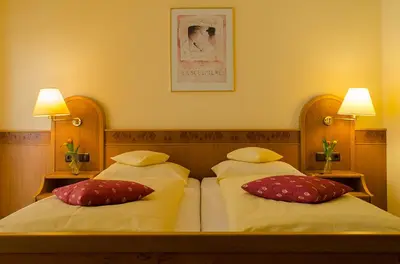 Ein Bett oder Betten in einem Zimmer der Unterkunft Gästehaus Vinetum
