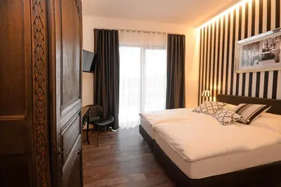 Ein Bett oder Betten in einem Zimmer der Unterkunft Vinotel Dollt-Kern
