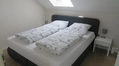 Ein Bett oder Betten in einem Zimmer der Unterkunft Weingut Grafenhof