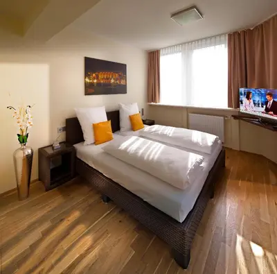 Ein Bett oder Betten in einem Zimmer der Unterkunft GuestHouse Mannheim