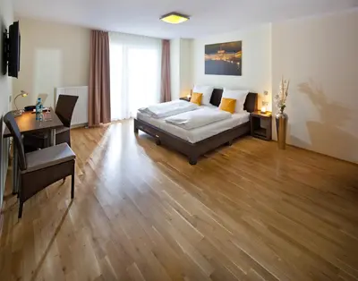 Ein Bett oder Betten in einem Zimmer der Unterkunft GuestHouse Mannheim