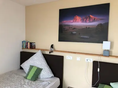 Ein Bett oder Betten in einem Zimmer der Unterkunft Kraft Hotel Alzey Worms A61