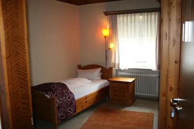 Ein Bett oder Betten in einem Zimmer der Unterkunft Hotel & Weinstube Restaurant Filling