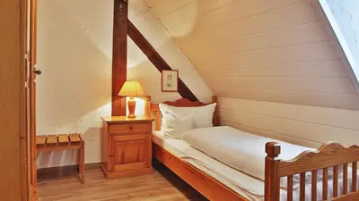 Ein Bett oder Betten in einem Zimmer der Unterkunft Hotel Restaurant Mönchhof