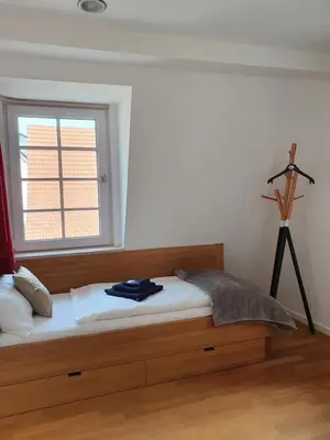 Ein Bett oder Betten in einem Zimmer der Unterkunft Gasthof zum Ochsen