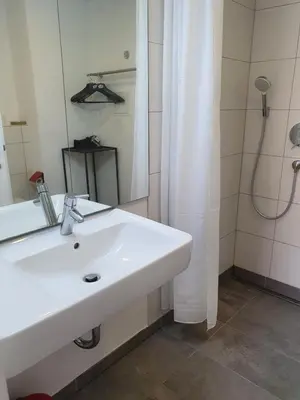 Ein Badezimmer in der Unterkunft Gasthof zum Ochsen