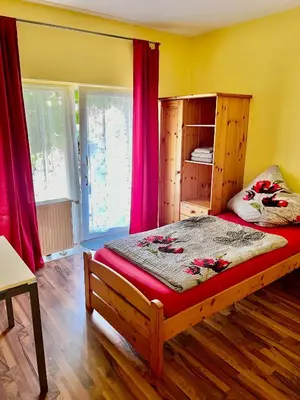Ein Bett oder Betten in einem Zimmer der Unterkunft Gästehaus Kerle
