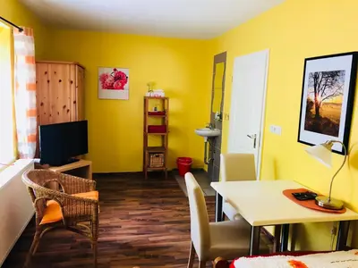 Ein Sitzbereich in der Unterkunft Gästehaus Kerle