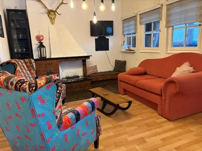Ein Sitzbereich in der Unterkunft Ferienhaus Bussard
