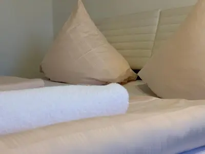 Ein Bett oder Betten in einem Zimmer der Unterkunft Hotel Restaurant Memo