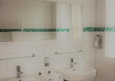 Ein Badezimmer in der Unterkunft Hotel Germersheimer Hof