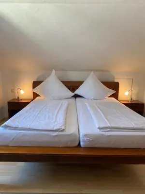 Ein Bett oder Betten in einem Zimmer der Unterkunft Pension Bergel