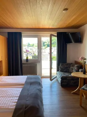 Ein Bett oder Betten in einem Zimmer der Unterkunft Pension Bergel