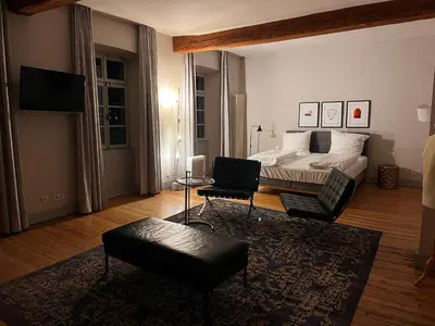 Ein Bett oder Betten in einem Zimmer der Unterkunft Klosterhof Weingut BoudierKoeller