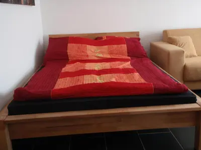 Ein Bett oder Betten in einem Zimmer der Unterkunft Ferienwohnung Mainz