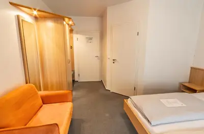 Ein Bett oder Betten in einem Zimmer der Unterkunft Hotel-Gasthof zum Ritter