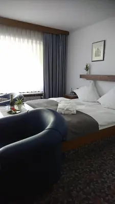 Ein Bett oder Betten in einem Zimmer der Unterkunft Café Blaich - Hotel Garni