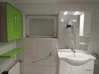 Ein Badezimmer in der Unterkunft Die Ferienwohnung in Lörzweiler