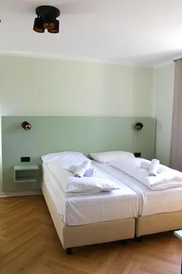 Ein Bett oder Betten in einem Zimmer der Unterkunft Autobahn Hotel Pfungstadt Ost